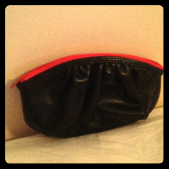 Laura Geller makeup clutch