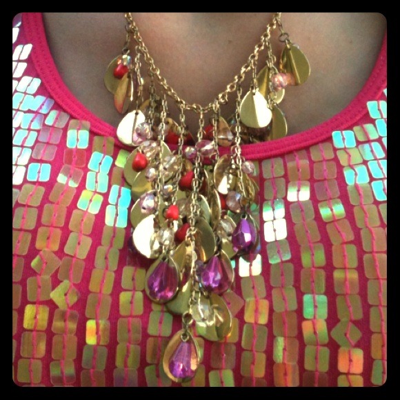 Exotic gold teardrop with colored stones necklace.