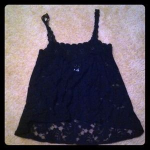 Spaghetti strapped black fashion top.