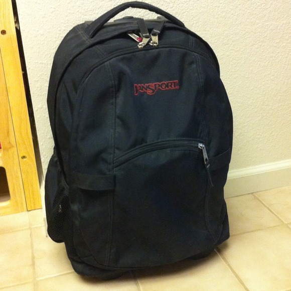 Black Jansport rolling backpack