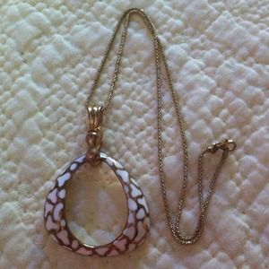 Goldstone and white enamel 2 sided necklace