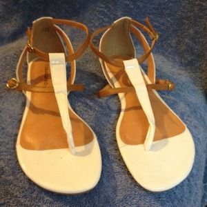 White and brown sandals, size 8.