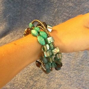Black and teal bead bracelet.