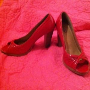 Red leather pumps