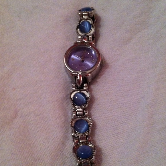 Blue jeweled watch