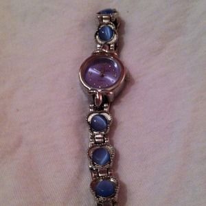Blue jeweled watch