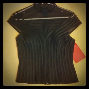 Sheer shouldered black top.