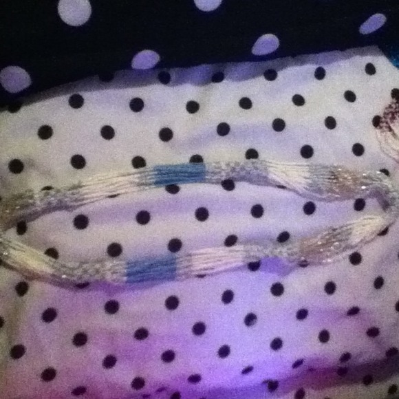 Pretty baby blue and white necklace .