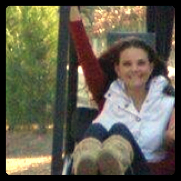 Super cute white vest.