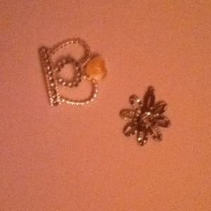 Charm is the flower and the crown is a pin:)