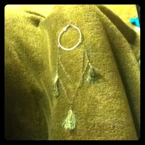 Gold hoop feather earrings