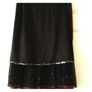 Black silk skirt beaded and stitched at bottom