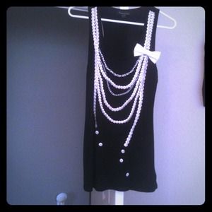 Broken pearl black tank with side bow