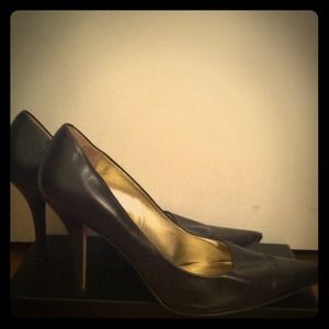 Chocolate brown pointy toe pumps