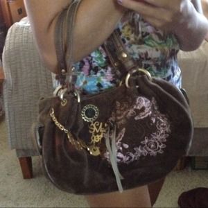 Brown suede Juicy Couture hand bag.