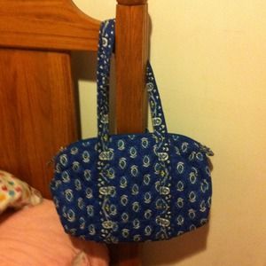 A blue purse with Vera's bradley looking bags!!!!!