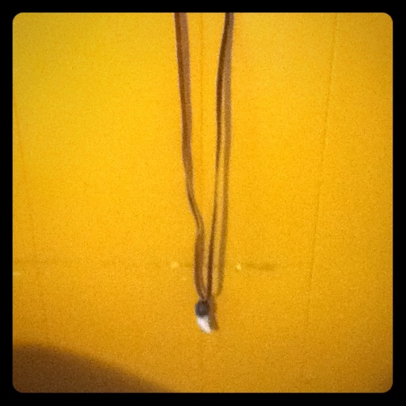Leather necklace w/ bear tooth & teal stone charm