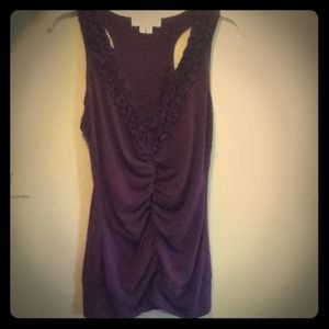 Low cut ruffle tank with a band on the bottom
