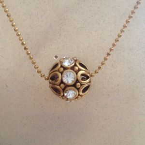Bronze sphere necklace with diamonds in bedded