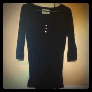 Black top with draw string waist line and buttons