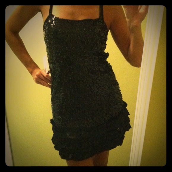 Small black sequin dress with ruffle bottom