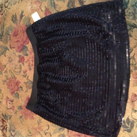 Mini and Maxi sequined Skirts