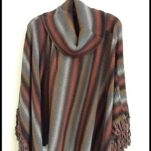 Knit poncho. BRAND NEW