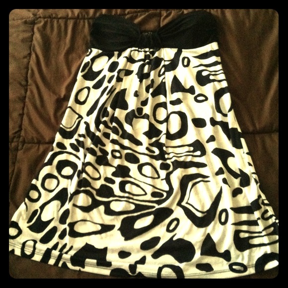 Black and white printed dress with plain black top