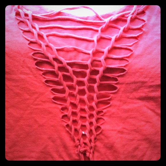 Hand cut and woven t-shirt.