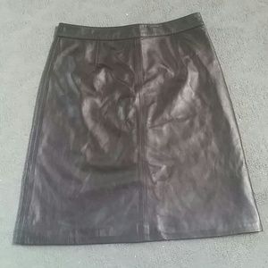 Black knee length leather skirt