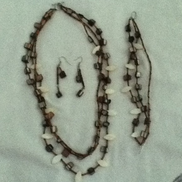 Shell/glass/acrylic set; tan, gray, and cream