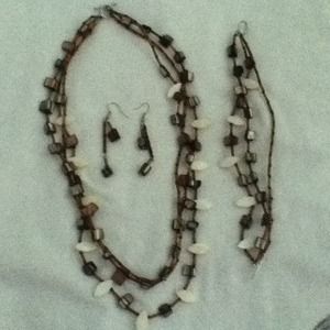 Shell/glass/acrylic set; tan, gray, and cream