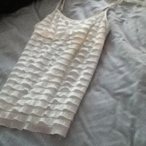 White ruffle tank *tight fit
