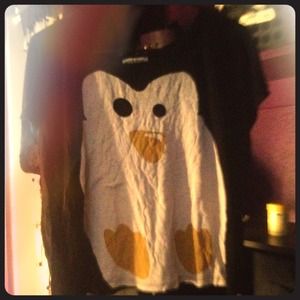 Off the should baggy penguin shirt :)