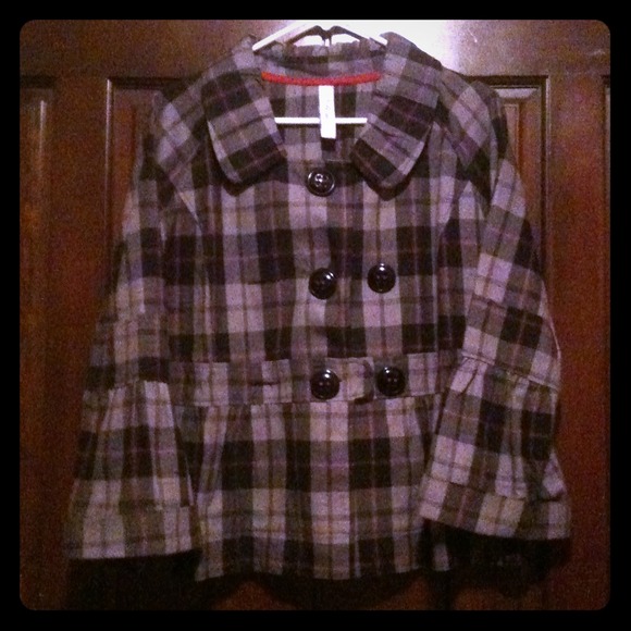 Black and gray checkered jacket with red strips