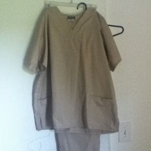 Beige colored Cherokee brand scrubs