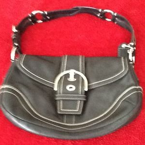 Blk Leather coach bag.