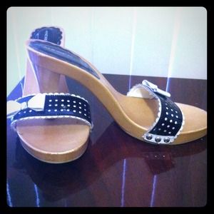 Black and white with a bow low heels shoes.