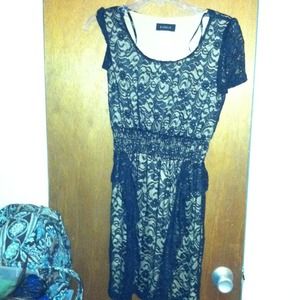 Lace dress with tan 5% lining. Great black dress