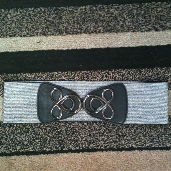 A black & silver designed belt