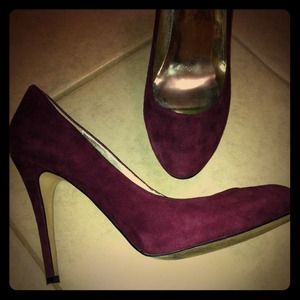 Burgundy GUESS pumps.