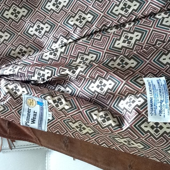 Genuine leather jacket with fringe.  Size 10.