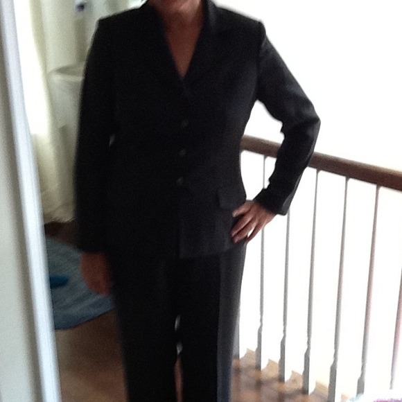 Dark gray fully lined pants suit.
