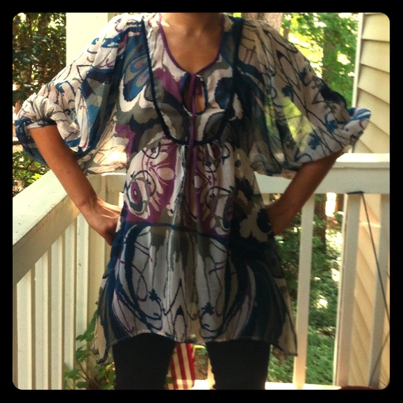 Nice airy, colorful,sheer shirt.