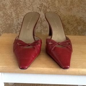 Red, pointed toe heeled mules