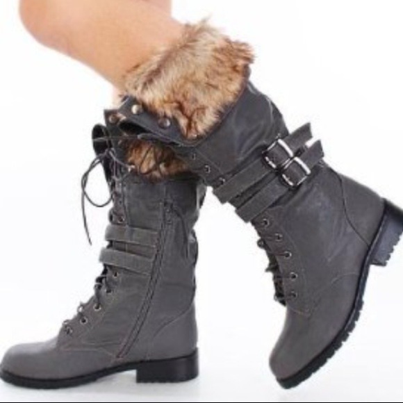 Boots - Fold down furry combat boots .