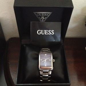 Guess brand men's watch.  New battery.
