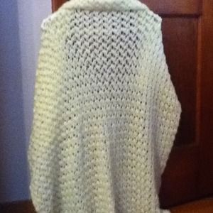Yellow knitted shawl