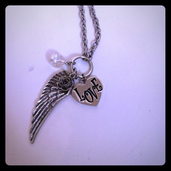 SOLD IN BUNDLE Silver wing and heart necklace!!