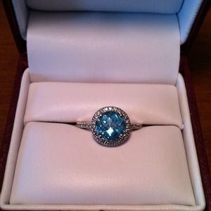 Blue Topaz ring with diamond accents.